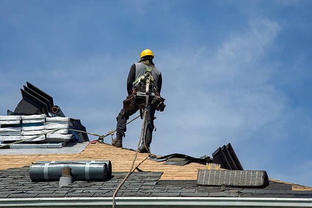 Professional Gutter Installation technician working in Falls, PA